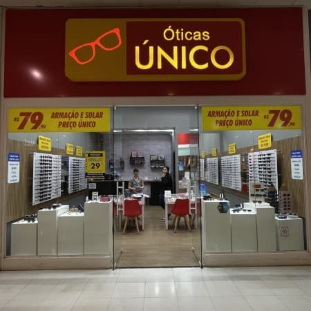 Logo da loja oticas unico