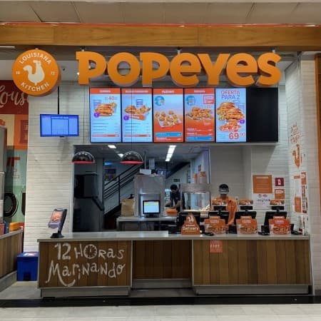 Logo da loja popeyes lousiana kitchen
